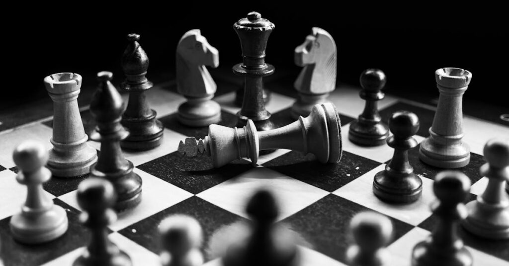 Grayscale Photography Of Chessboard Game