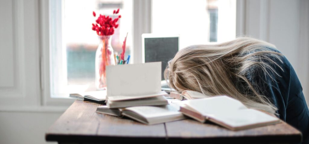 frustrated author with her head on the table