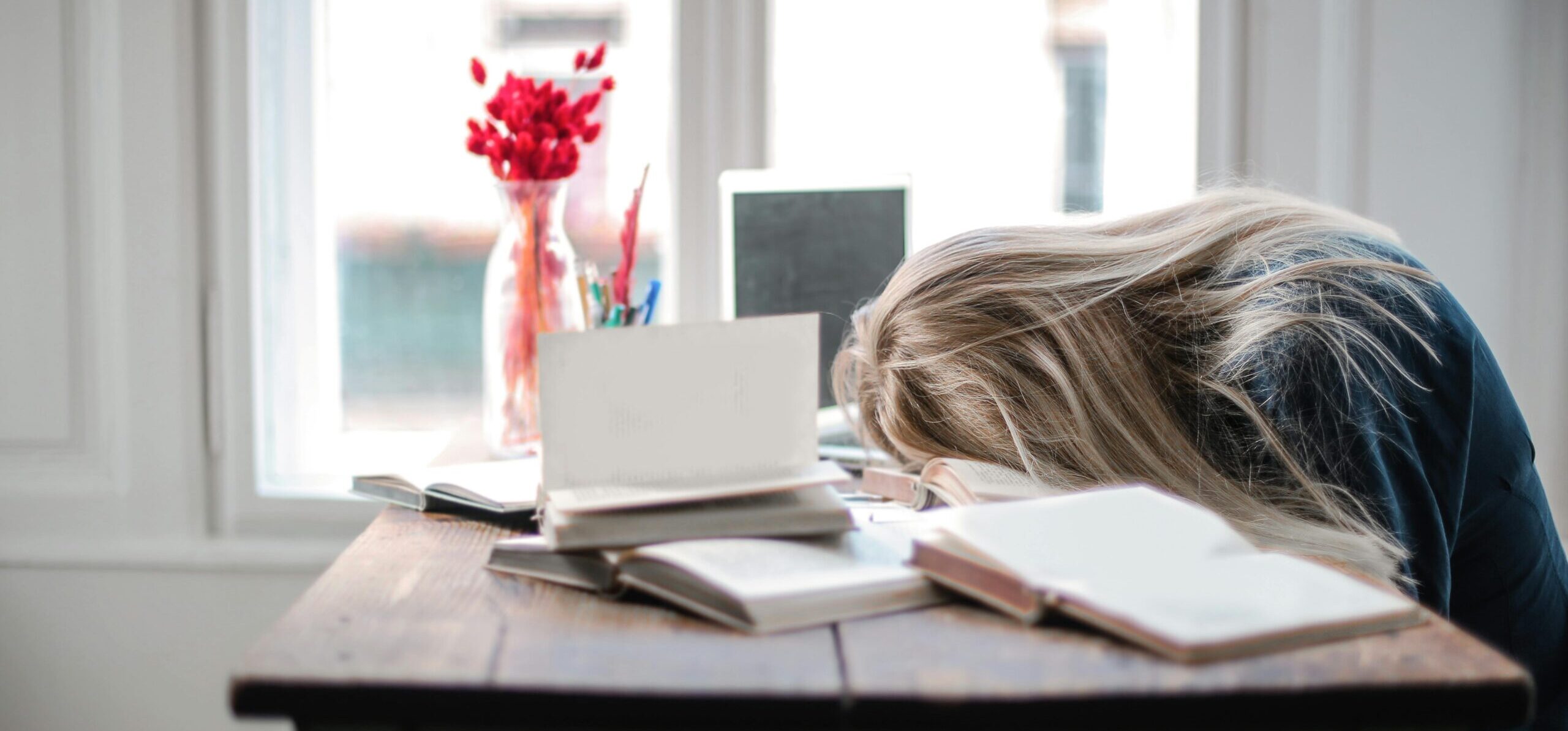 frustrated author with her head on the table