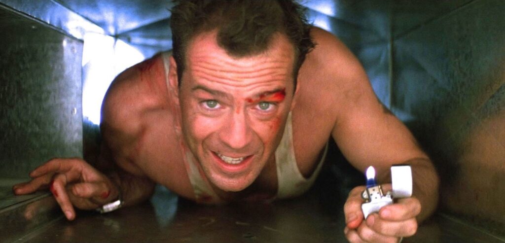 still from Die Hard (1988) featuring Bruce Willis as John McClane