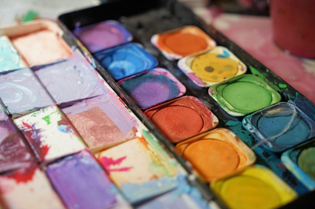 A painter's palette, representing how an author can use lighting and colour to evoke mood and tone in fiction