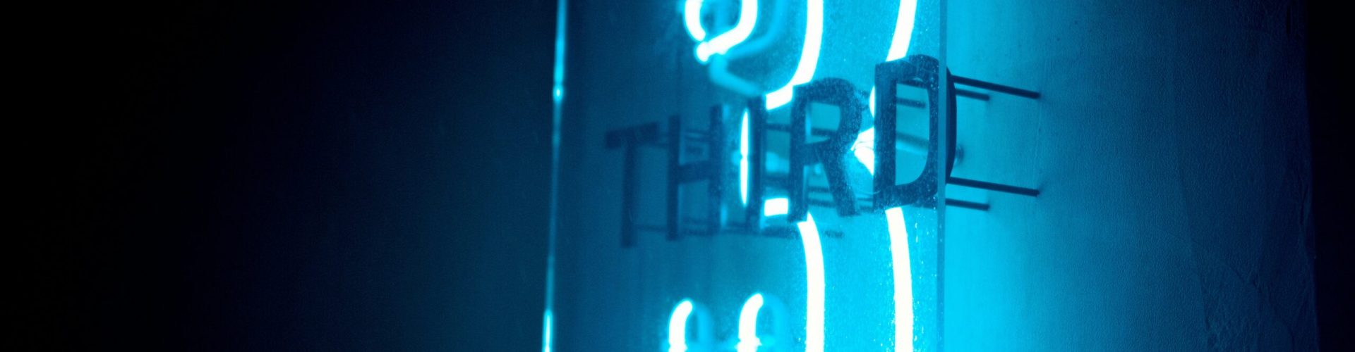 Neon sign of#3 and third